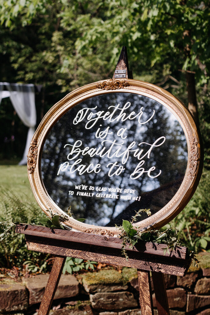 An intimate rustic NJ real wedding at Prallsville Mill | Lace and Belle calligraphy mirror welcome sign | Erin + Brandon | Love me Do Photography