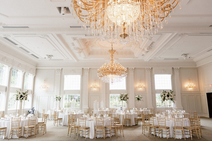 Modern white floral centerpieces and candle centerpieces | The Estate at Florentine Gardens ballroom | Charming Images