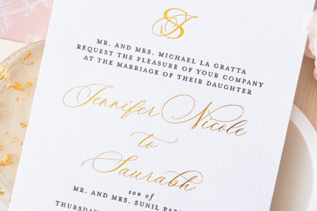 Lace and Belle metallic gold stamped wedding invitation with custom monogram