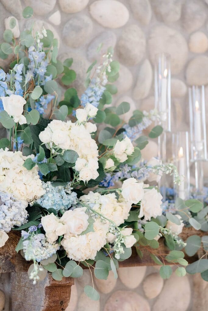 Blue wedding ceremony flowers at the Boathouse Chapel, Mallard Island Estate weddings
